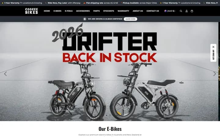 Coogee Bikes homepage showing two electric bikes under the headline 2026 Drifter back in stock, with a currency selector set to Australian dollars.